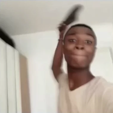 Wide-eyed reaction face for a meme challenge